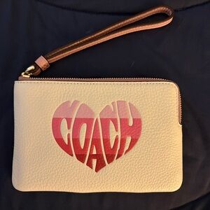 Coach Cream Wristlet with pink striped Heart Logo